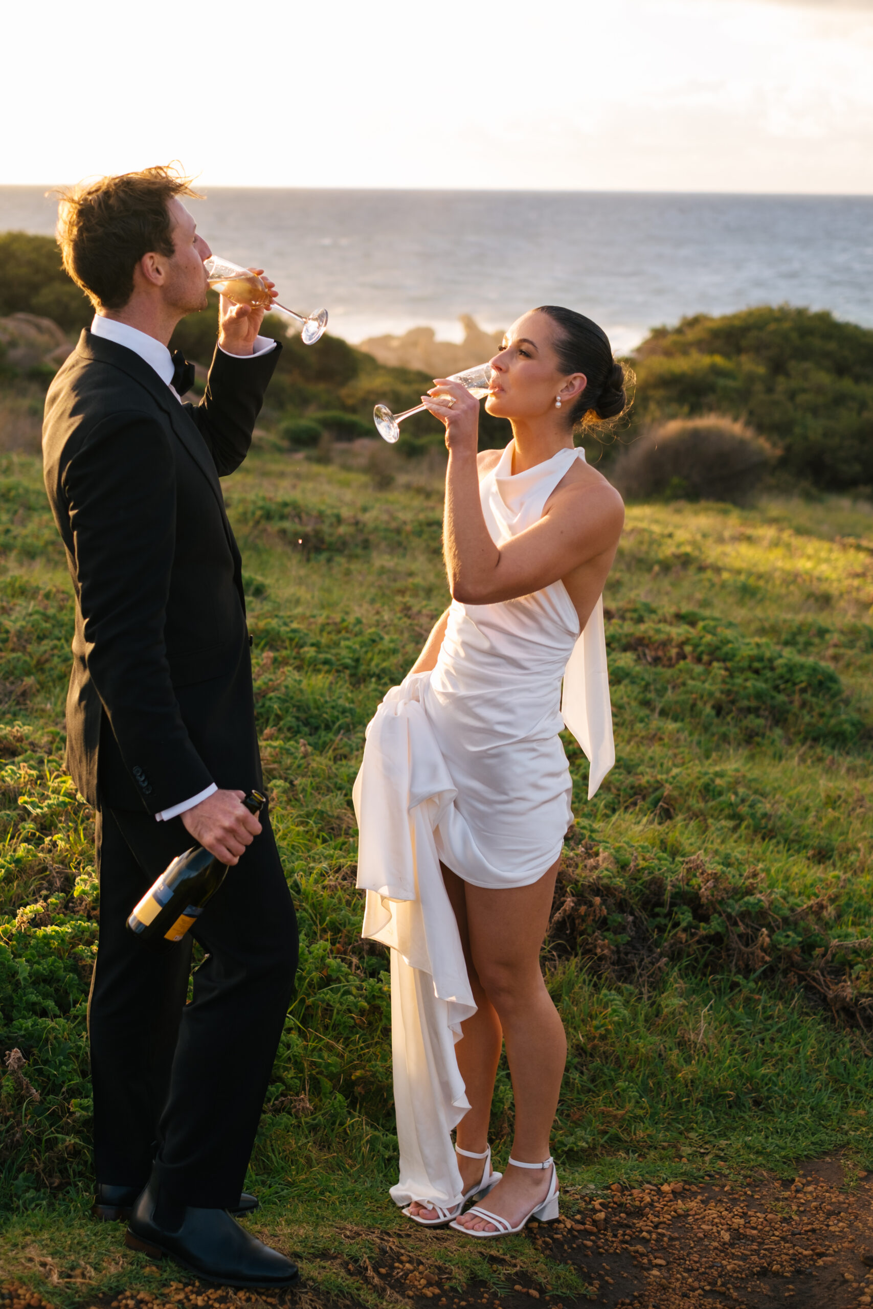 Couple drinking champagne after getting eloped cape naturaliste