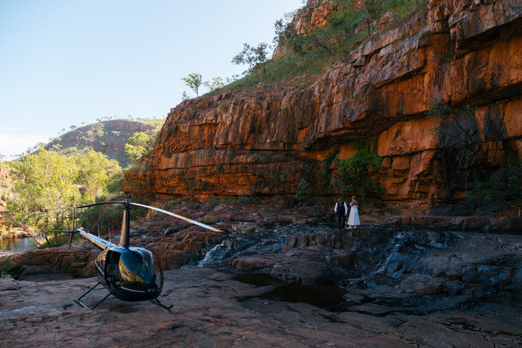 helicopter adventure wedding couple exploring kununurra waterfalls